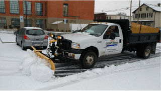 Gassert Roofing Images - gassert truck plowing snow